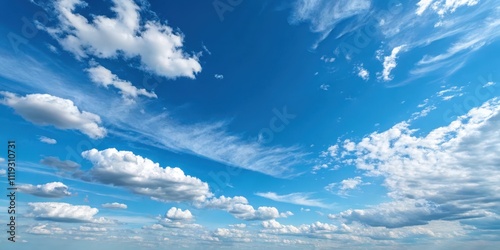 A breathtaking panoramic view of a vibrant blue sky adorned with fluffy cumulus clouds and wispy cirrus formations, creating a stunning natural masterpiece.