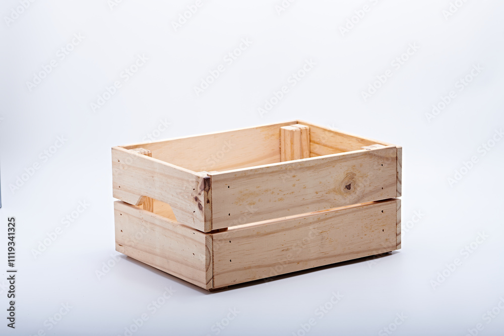 Wooden box for storing fresh vegetables photographed on a white background Wooden box for storing fresh vegetables photographed on a white background