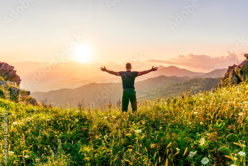 man doing hiking sport in mountains with anazing highland view