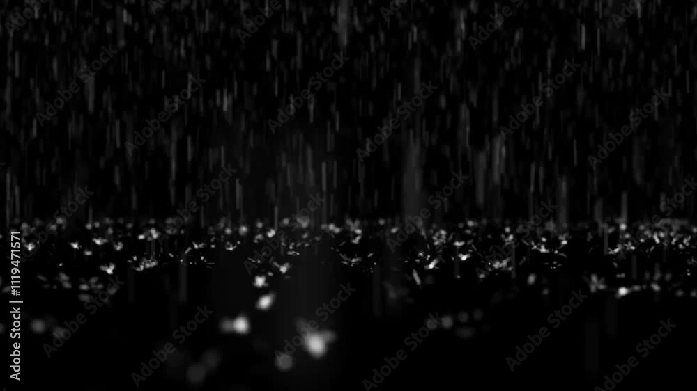 Falling rain on a black background.
