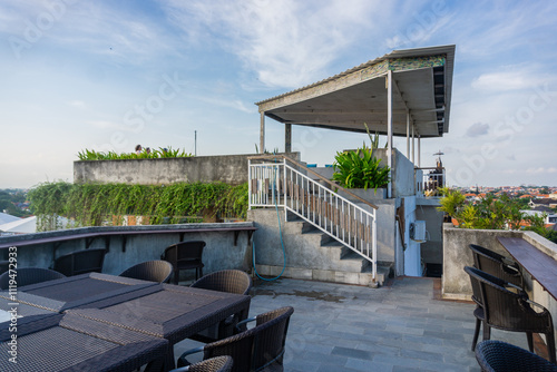 An aerial view of a village in the North Kuta district of Canggu, Bali. sunset and a gentle breeze accompany the view.