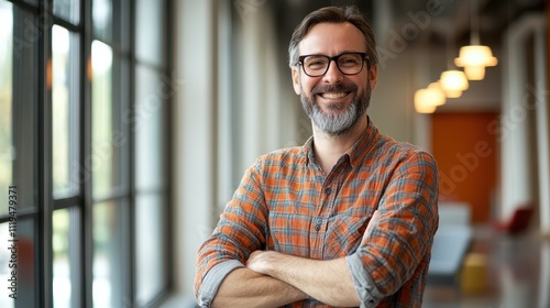 The Smiling Man in Glasses