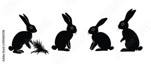 Black Rabbit Silhouettes in Sitting, Grazing, and Alert Woodland Poses photo