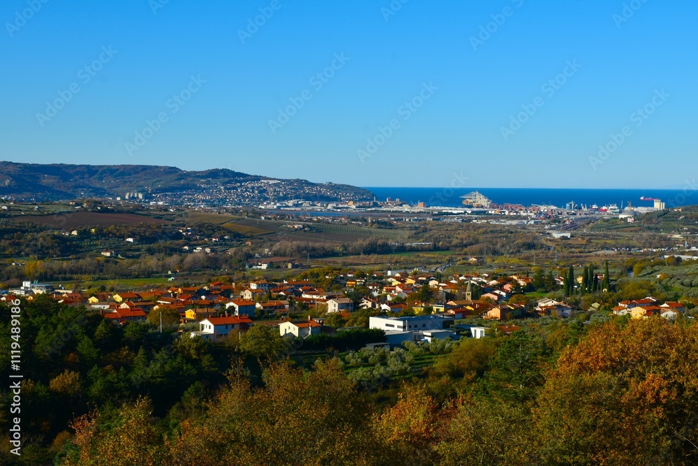 Fototapeta premium View of Dekani village and the port town of Koper at the coast of the Adriatic sea in Istria and Littoral region of Slovenia