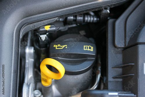 Obraz na płótnie Concealed dipstick and oil filler cap in a modern vehicle engine bay w salonie