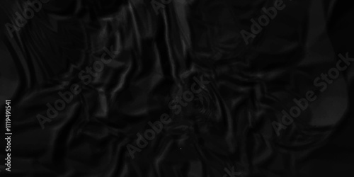 Dark black crumpled paper texture background. black crumpled and top view textures can be used for background of text or any contents.