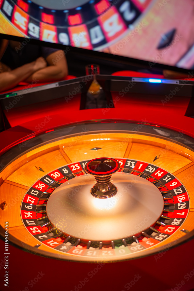Close up shot of a spinning roulette. Presentation of a luxury casino roulette wheel. Gambling. Lucky game Close up shot of a spinning roulette. Presentation of a luxury casino roulette wheel. Gambling. Lucky game