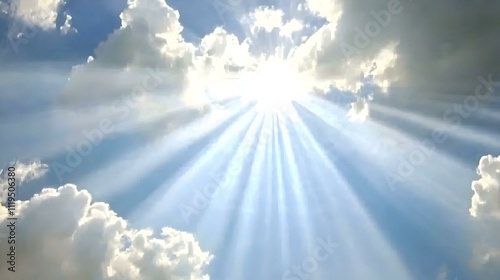 Heavenly sun rays piercing through fluffy clouds. Serene, bright, and hopeful. Ideal for backgrounds or spiritual themes.