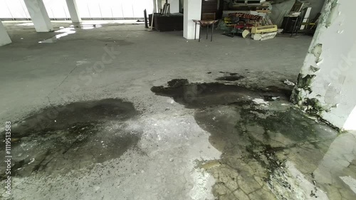 Stains on the wall, Corrosion of the wall due to rain, Corroded cement wall.Creamy textured white wall with rough and faded streaks on the concrete cement.Stairs with Stainless Steel Staircase Railing