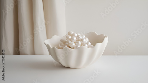 white pearls, ceramic shell, elegant decor, modern aesthetic, luxury bowl, natural pearls, chic decor, glossy pearls, timeless elegance, soft light, refined design, pearl arrangement, artistic decor photo