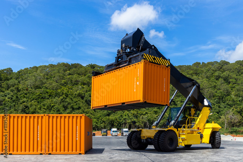 Картината върху платно Reach stacker cargo forklift container box import export logistic transportation industrial, Reach stacker pick up container, Reach stacker container loader crane lifting maritime cargo container