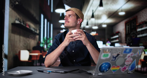 Man Designer With Laptop In Restaurant