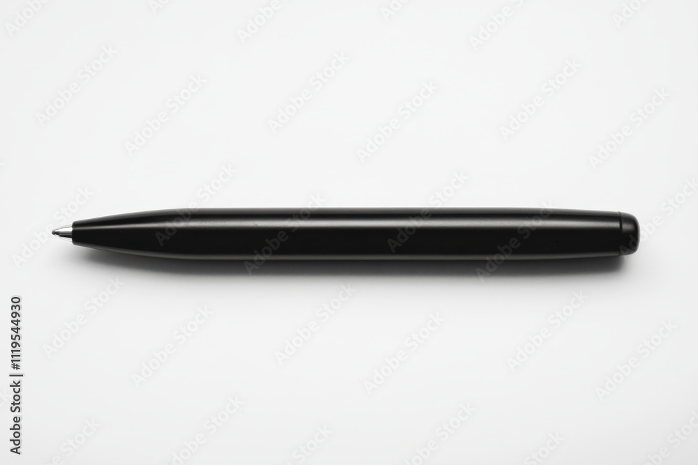 Black ballpoint pen on a white background ready for writing Black ballpoint pen on a white background ready for writing