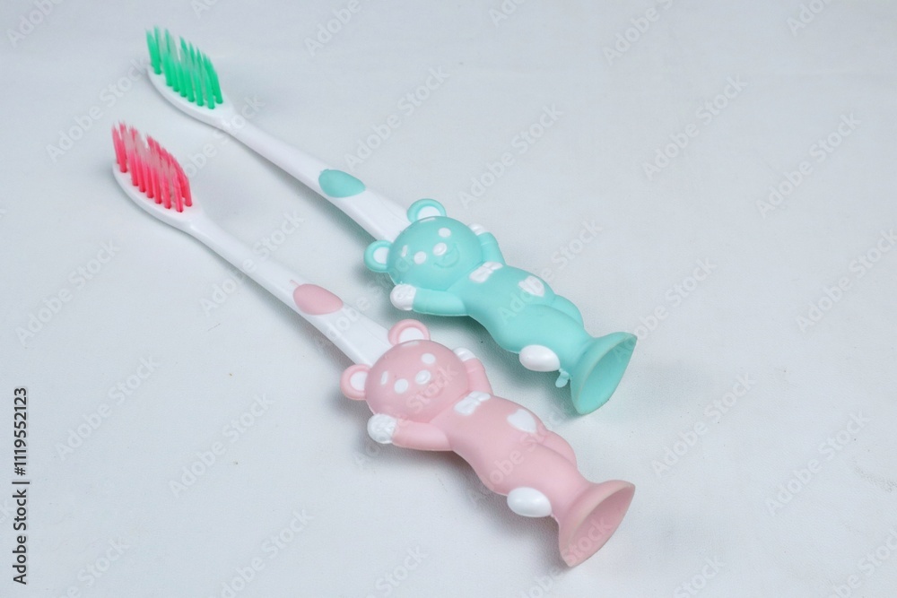 toothbrush with cub bear character isolated on white