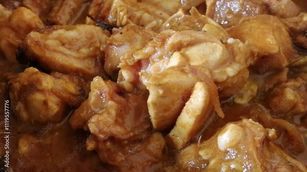 Cooking of organic chicken meat. Raw white meat mixed with spices to make delicious and famous recipe like peri-peri, butter chicken, fried, Pollo al acuyo, Karaage, Ayam goreng Cooking of organic chicken meat. Raw white meat mixed with spices to make delicious and famous recipe like peri-peri, butter chicken, fried, Pollo al acuyo, Karaage, Ayam goreng