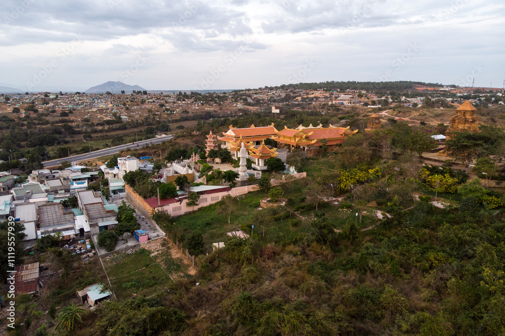 Fototapeta premium Buu Son Buddhist Temple near the Poshanu or Po Sahu Inu Cham Tower in Phan Thiet city in Vietnam, top view, aerial view