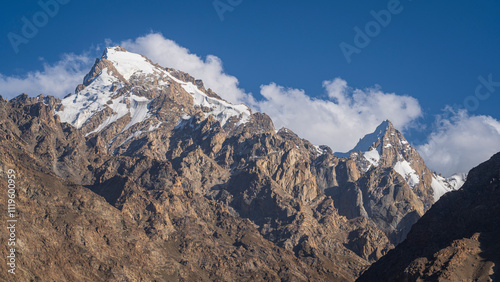 Scenic mountain landscape view of snowcapped Hindu Kush peaks in summer, Wakhan Corridor, Ishkashim, Gorno-Badakhshan, Tajikistan