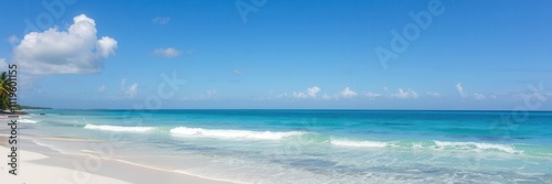 Tropical paradise with soft sandy beach and lush green island in distance, ocean, coastline, exotic