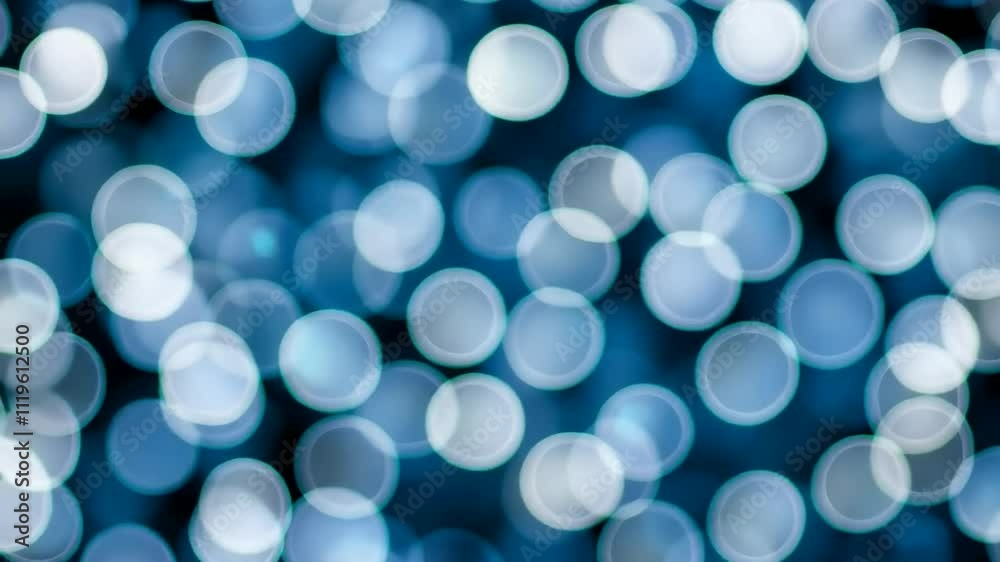 Abstract blue bokeh lights creating a festive background, ideal for Christmas and New Year concepts Abstract blue bokeh lights creating a festive background, ideal for Christmas and New Year concepts
