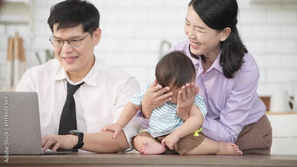 Parents and son play together after dad comes home from work Parents and son play together after dad comes home from work