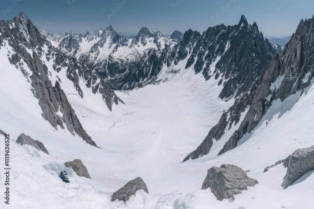 A breathtaking view of a snow-covered mountain landscape with jagged peaks. A breathtaking view of a snow-covered mountain landscape with jagged peaks.