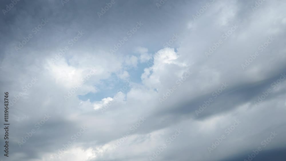 Beautiful white and dark storm clouds in blue sky. Volumetric effect. Convection in troposphere. Real time. Cumulus clouds low-level, puffy, cotton-like. Fluffy Cumulonimbus. Rainy terrible clouds Beautiful white and dark storm clouds in blue sky. Volumetric effect. Convection in troposphere. Real time. Cumulus clouds low-level, puffy, cotton-like. Fluffy Cumulonimbus. Rainy terrible clouds