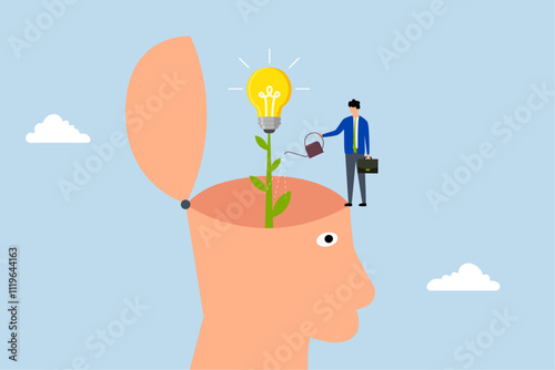 Grow new idea, businessman nurturing young plant with bright idea blossom. 