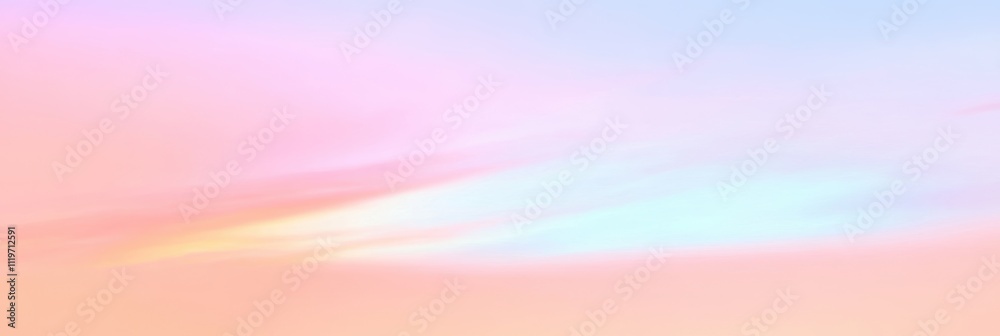 Fototapeta premium 美しい夕焼けの空が広がる薄いピンクと青のグラデーション