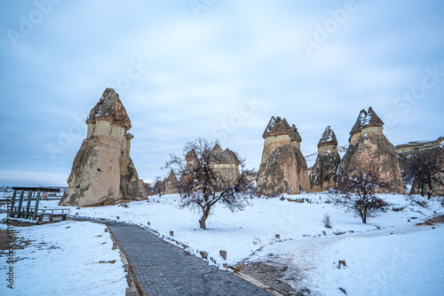 Priests Valley and today Paşabağları, is covered with unique fairy chimneys. Chapel and sitting areas are carved into the interior of some fairy chimneys in Nevşehir, Turkey photo