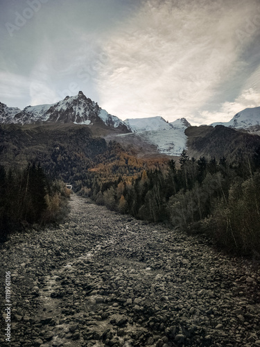 Glacier des bossons and aiguille du midi Mont Blanc dominating chamonix valley in autumn