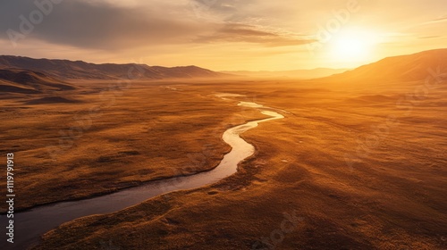 Drone view of serene golden hour river winding through pristine desert landscape with mountains under a radiant sunset sky photo