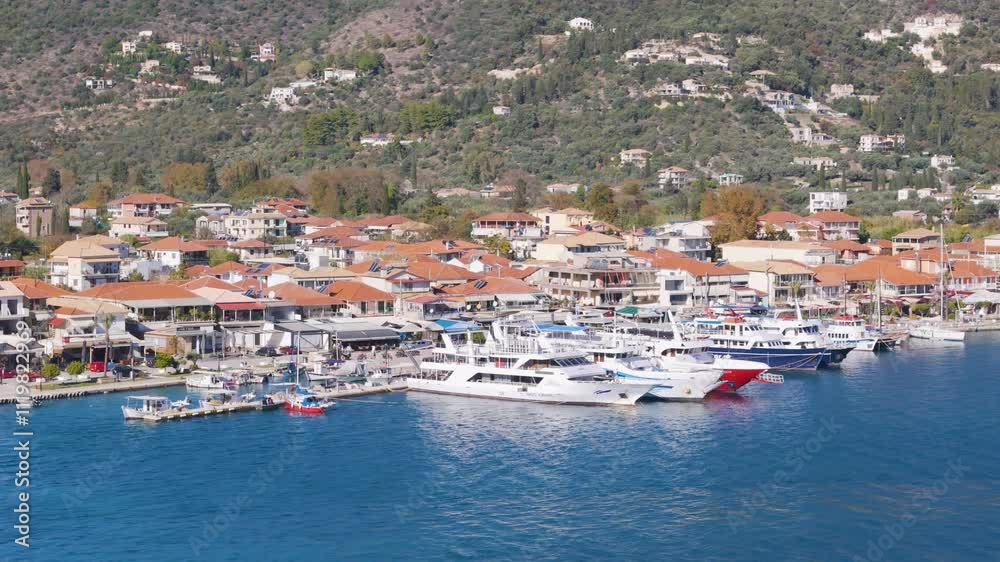 Aerial drone view of the coastal town of Nydri on the island of Lefkada in Greece. Aerial drone view of the coastal town of Nydri on the island of Lefkada in Greece.
