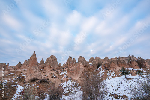 Priests Valley and today Paşabağları, is covered with unique fairy chimneys. Chapel and sitting areas are carved into the interior of some fairy chimneys in Nevşehir, Turkey photo