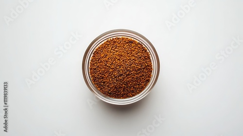 Bee pollen granules in a glass bowl highlighting their superfood benefits and nutrient composition against a clean white background.