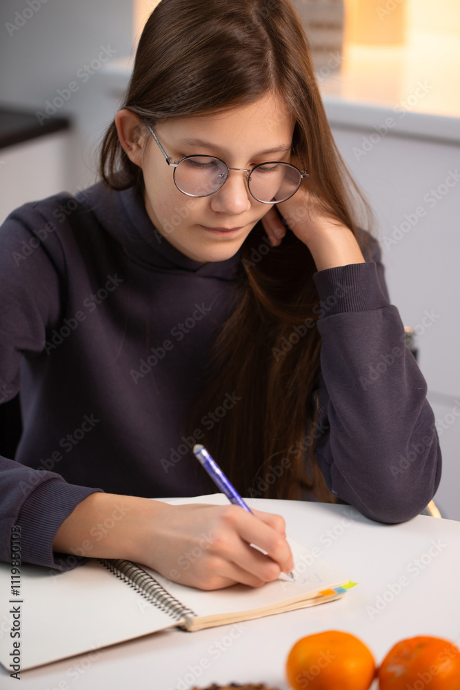 Thoughtful girl writing letter to Santa, preparing for Christmas holiday. Thoughtful girl writing letter to Santa, preparing for Christmas holiday.