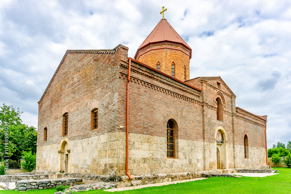 Fototapeta premium Ancient Caucasian Albanian Bulun Temple of Blessed Virgin Mary in Azerbaijan, Qabala region, August 2024