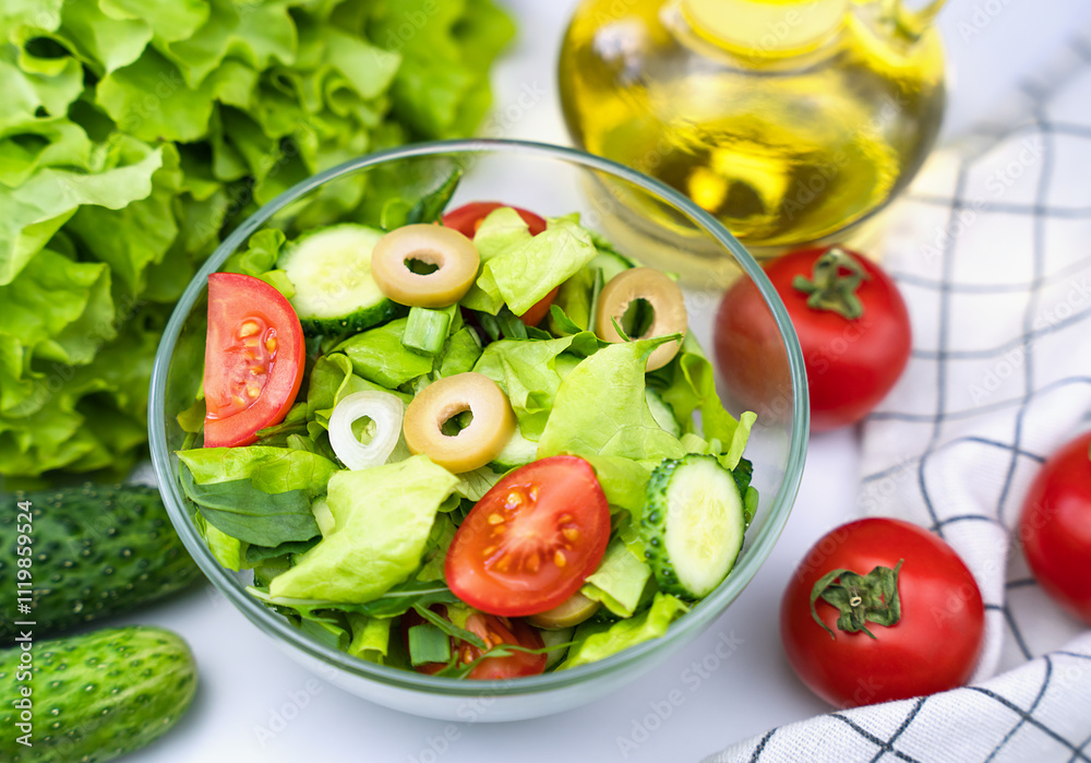 Healthy salad of fresh vegetables and greens on the table. Healthy food concept. Close-up. Selective focus. Healthy salad of fresh vegetables and greens on the table. Healthy food concept. Close-up. Selective focus.