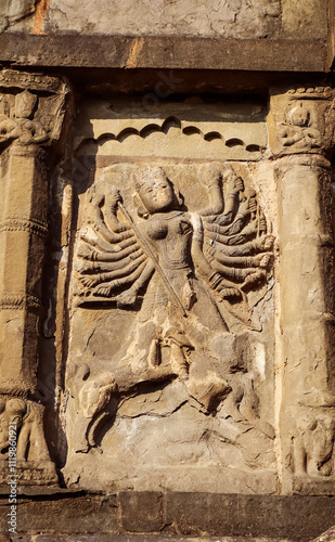 Ruin Carving Sculpture of Mahishasurmardini on the Siva Dol, Sivasagar, Assam, India. photo