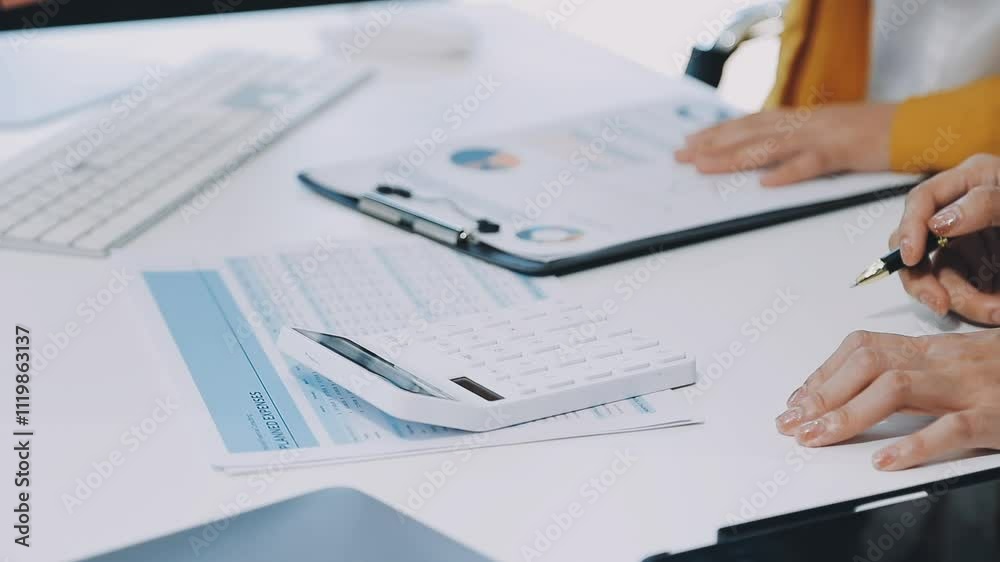 Meeting with business partners to discuss financial advisors to analyze market growth charts in business reports and plan investment strategies. Meeting with business partners to discuss financial advisors to analyze market growth charts in business reports and plan investment strategies.