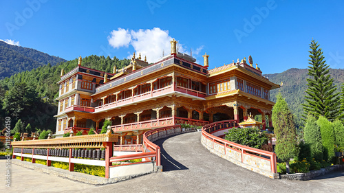 Panoramic view of the Thupsung Dhargye Ling Buddhist Monastery complex nestled in the hills, Dirang, West Kameng, Arunachal Pradesh, India. photo