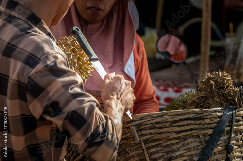 A farmer stall at the Kep market in Cambodia selling durian fruits photo