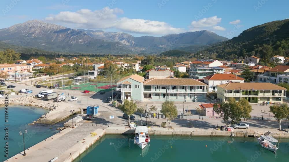Aerial drone video of the coastal town named Vasiliki on the island of Lefkada in Greece. Aerial drone video of the coastal town named Vasiliki on the island of Lefkada in Greece.