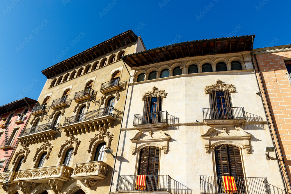 Obraz premium Colorful old houses along the Plaza Mayor de Vic square in Vic, Barcelona, Catalonia, Spain, Europe