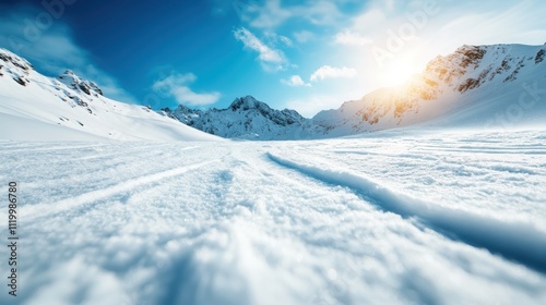 Expansive, snow-covered mountains bask in sunlight, forming a tranquil and breathtaking panorama of natural beauty and the quiet majesty of the winter landscape.