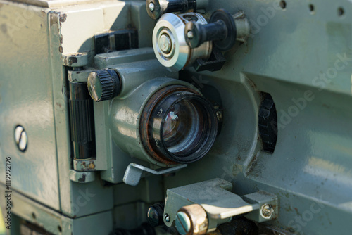 Detailed close-up of an old camera lens showcasing intricate mechanics photo