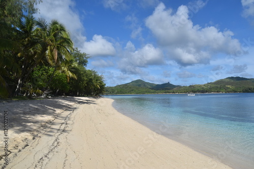 The turquoise Pacific Ocean around the paradise beaches and islands of Fiji photo