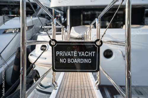 Private Yacht No Entry sign of a superyacht on a dock 