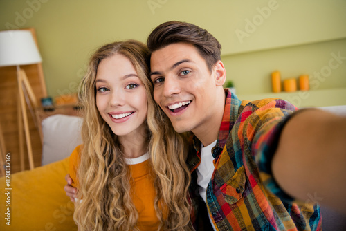 Photo of lovely young couple smile take selfie photo spend time spacious house spring summer indoors room photo