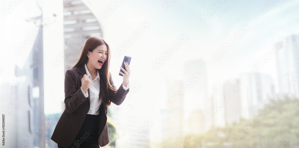 Confident Asian businesswoman standing on a busy city street with a smartphone in her hand, stylish and professional, representing the modern entrepreneur. Confident Asian businesswoman standing on a busy city street with a smartphone in her hand, stylish and professional, representing the modern entrepreneur.