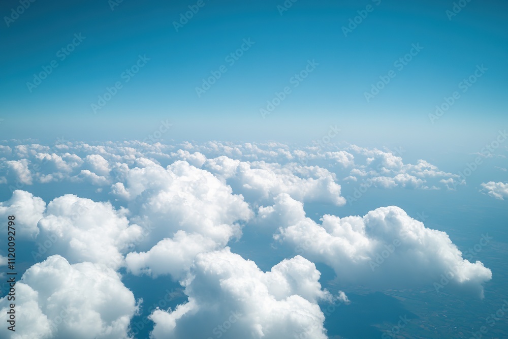 Fluffy cumulus clouds from above with clear blue sky Fluffy cumulus clouds from above with clear blue sky